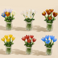 Set mit Miniatur-Blumenfiguren aus farbigem Glas