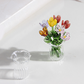 Set mit Miniatur-Blumenfiguren aus farbigem Glas