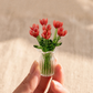 Set mit Miniatur-Blumenfiguren aus farbigem Glas