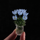 Set mit Miniatur-Blumenfiguren aus farbigem Glas