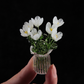 Set mit Miniatur-Blumenfiguren aus farbigem Glas