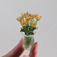 Set mit Miniatur-Blumenfiguren aus farbigem Glas