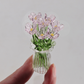 Set mit Miniatur-Blumenfiguren aus farbigem Glas